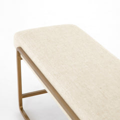 Beige bench with a gold frame on a white background