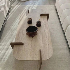 Coffee table with decorative items in a living room setting