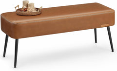 Brown leather bench with black legs on a white background