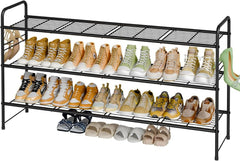 Black metal shoe rack with multiple pairs of shoes on three shelves.