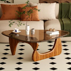 Wooden coffee table with decorative items in a living room setting