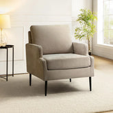 beige accent chair in a living room.
