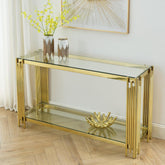 Gold console table with glass top in a room setting