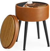 Round brown leather stool with a wooden lid on a white background