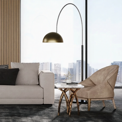 Modern living room with a beige sofa, armchair, and floor lamp.