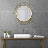 Round wall mirror in golden colour - All India Decor