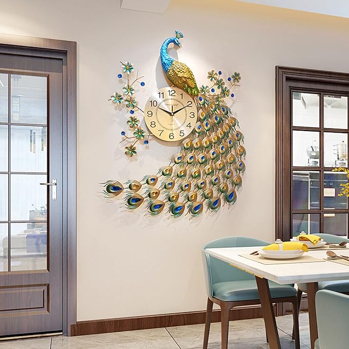 Decorative peacock wall clock on a wall in a room with a table and chairs.