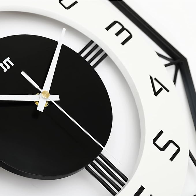 Close-up of a clock with black face and white numbers