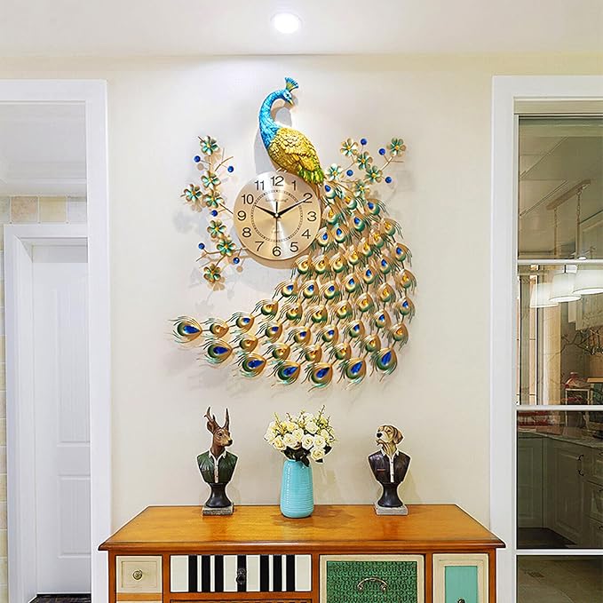 Decorative peacock wall clock on a wall with a wooden cabinet below.