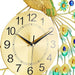 Decorative wall clock with peacock feather design on a white background