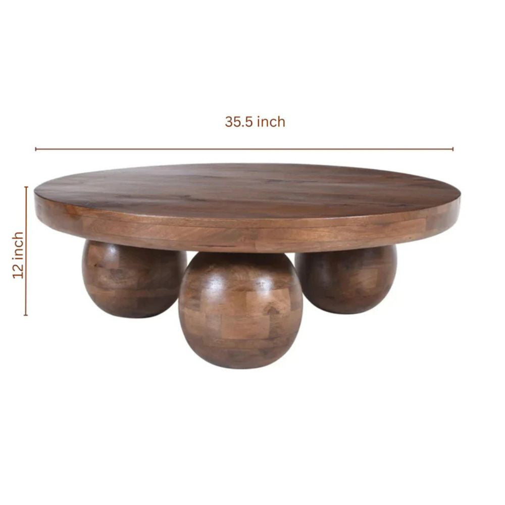Wooden table with spherical bases and dimensions on a white background