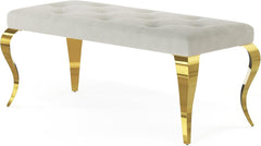 White tufted bench with gold legs on a white background