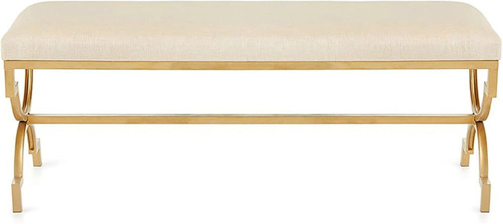Beige upholstered bench with gold metal frame on a white background