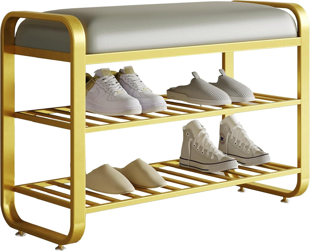 Gold shoe rack with white cushioned top holding various shoes on a white background