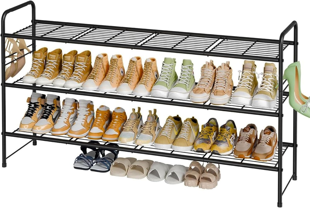Black metal shoe rack with multiple pairs of shoes on three shelves.