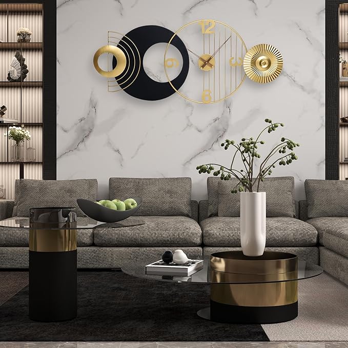 Modern living room with gray sofa, decorative clock, and stylish coffee table.