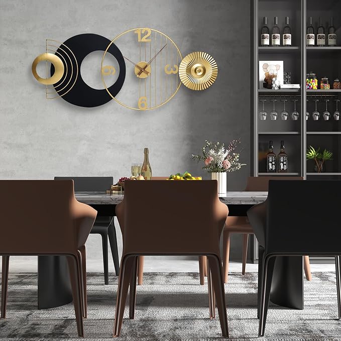 Dining room with modern wall clock, table, chairs, and a shelf with decorative items.