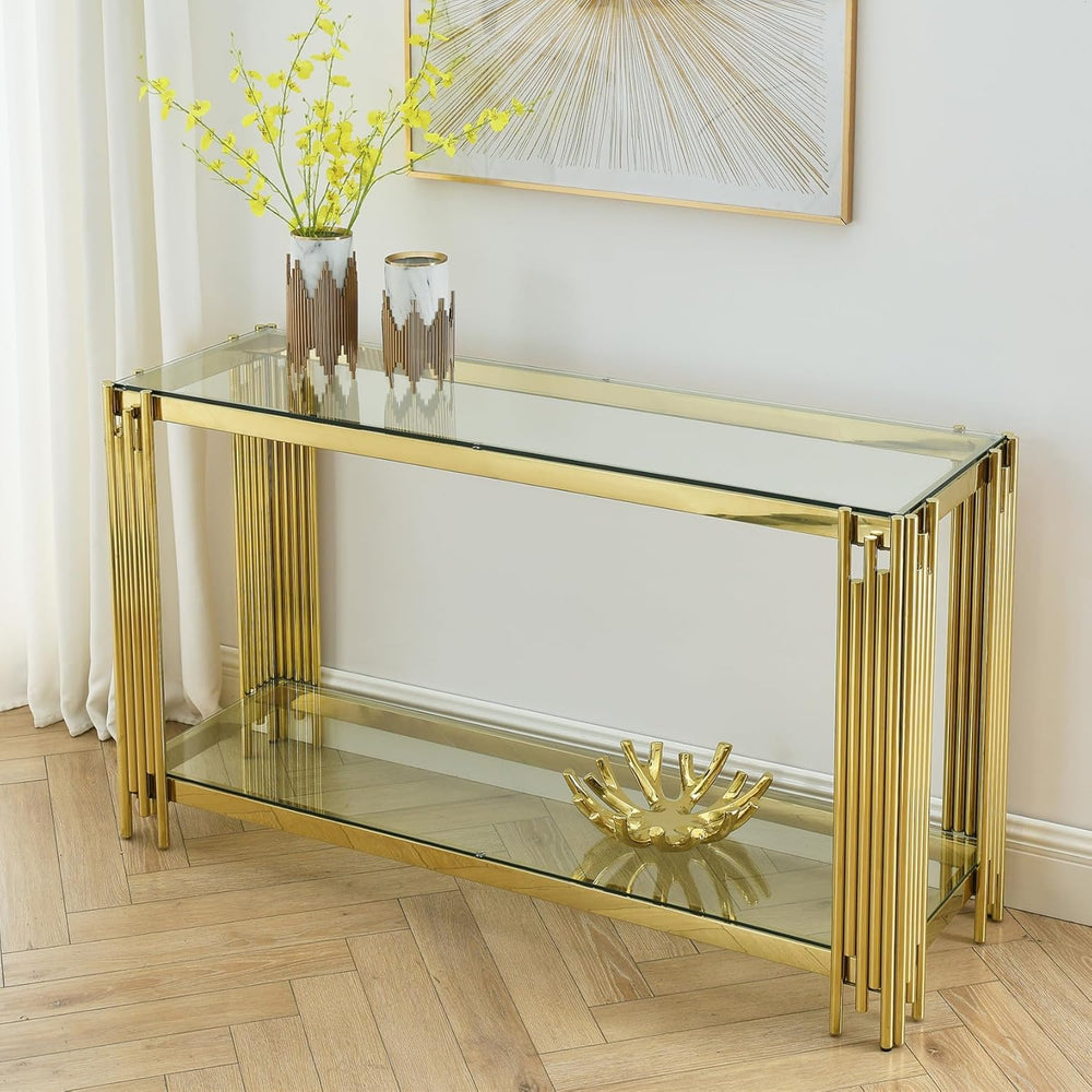 Gold console table with glass top in a room setting