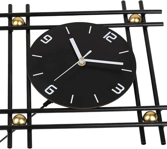 Black clock with white hands on a decorative metal grid background