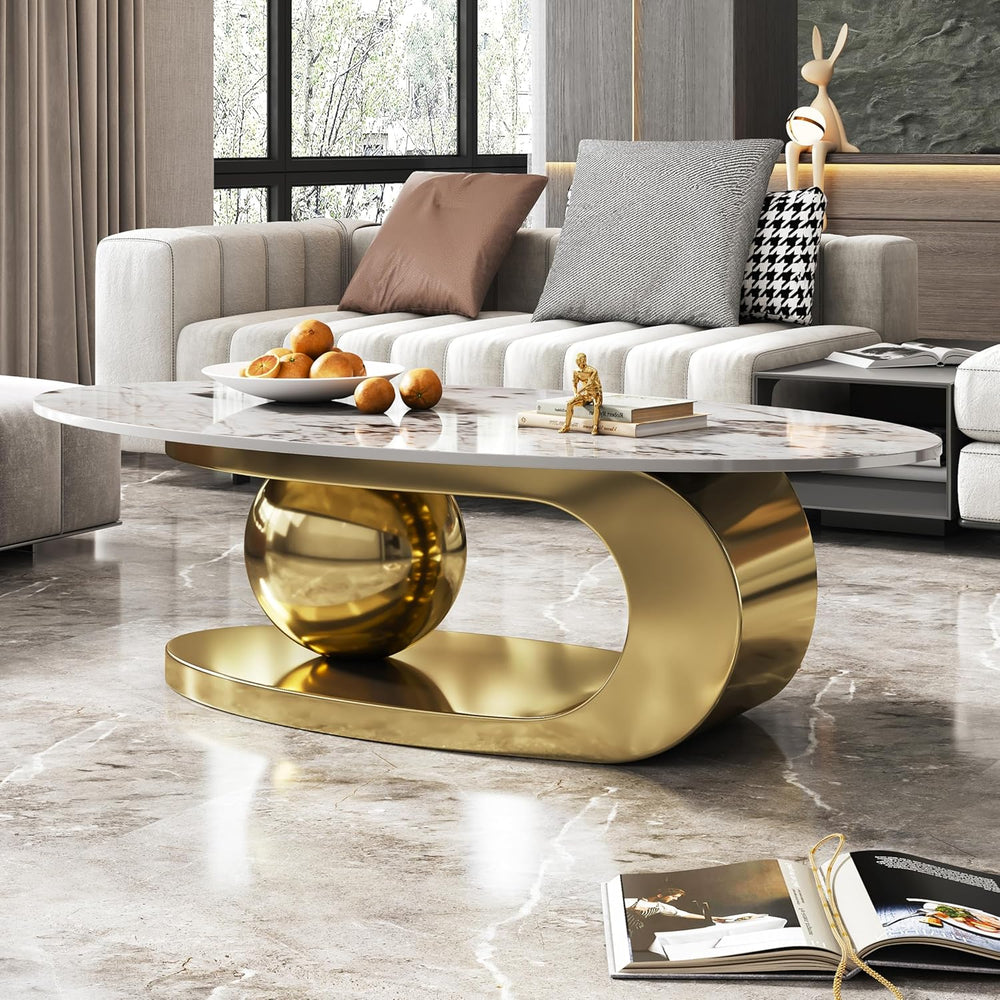 Gold coffee table with marble top in a modern living room