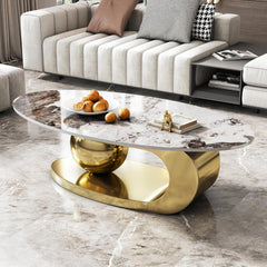 Modern living room with a marble coffee table and decorative items.