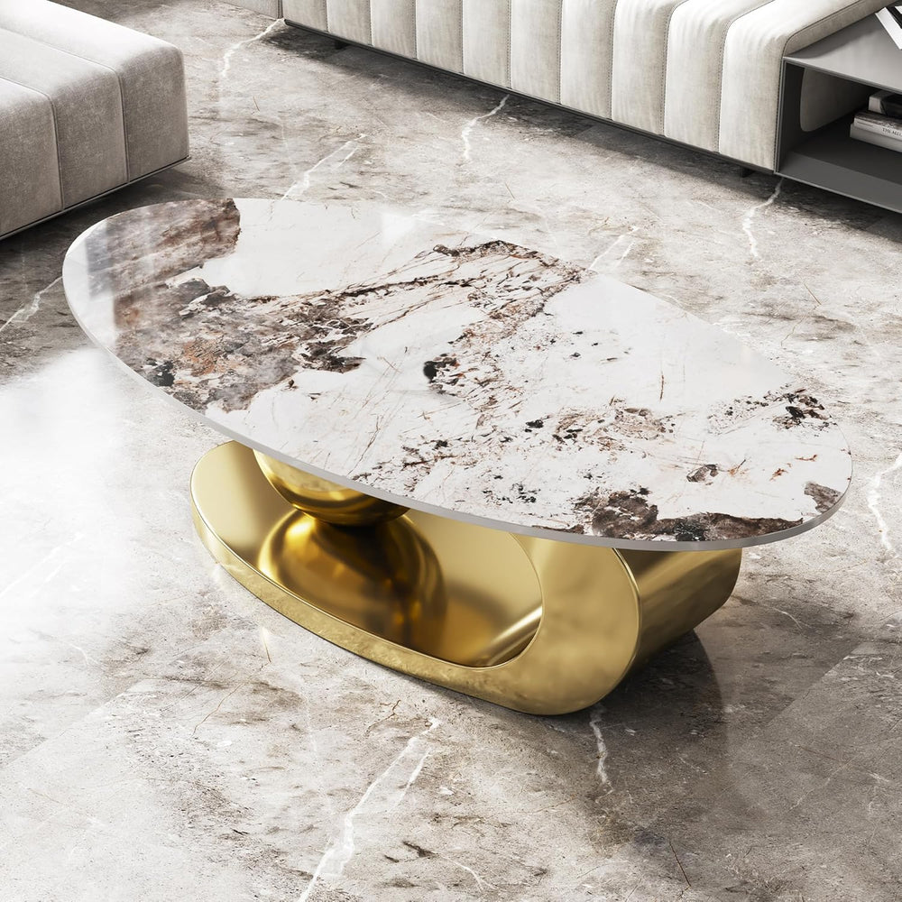 Marble coffee table with gold base in a modern living room setting
