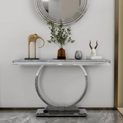 Modern console table with decorative items against a white wall