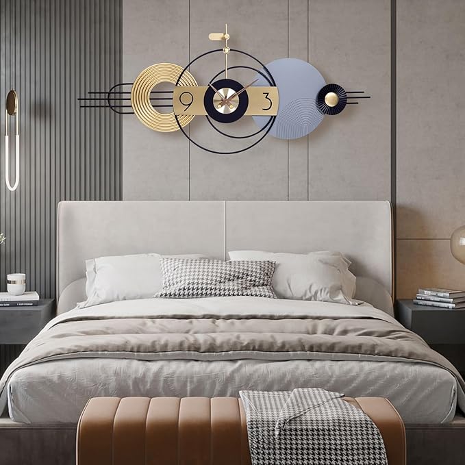Modern bedroom with a bed, decorative wall clock, and side tables.