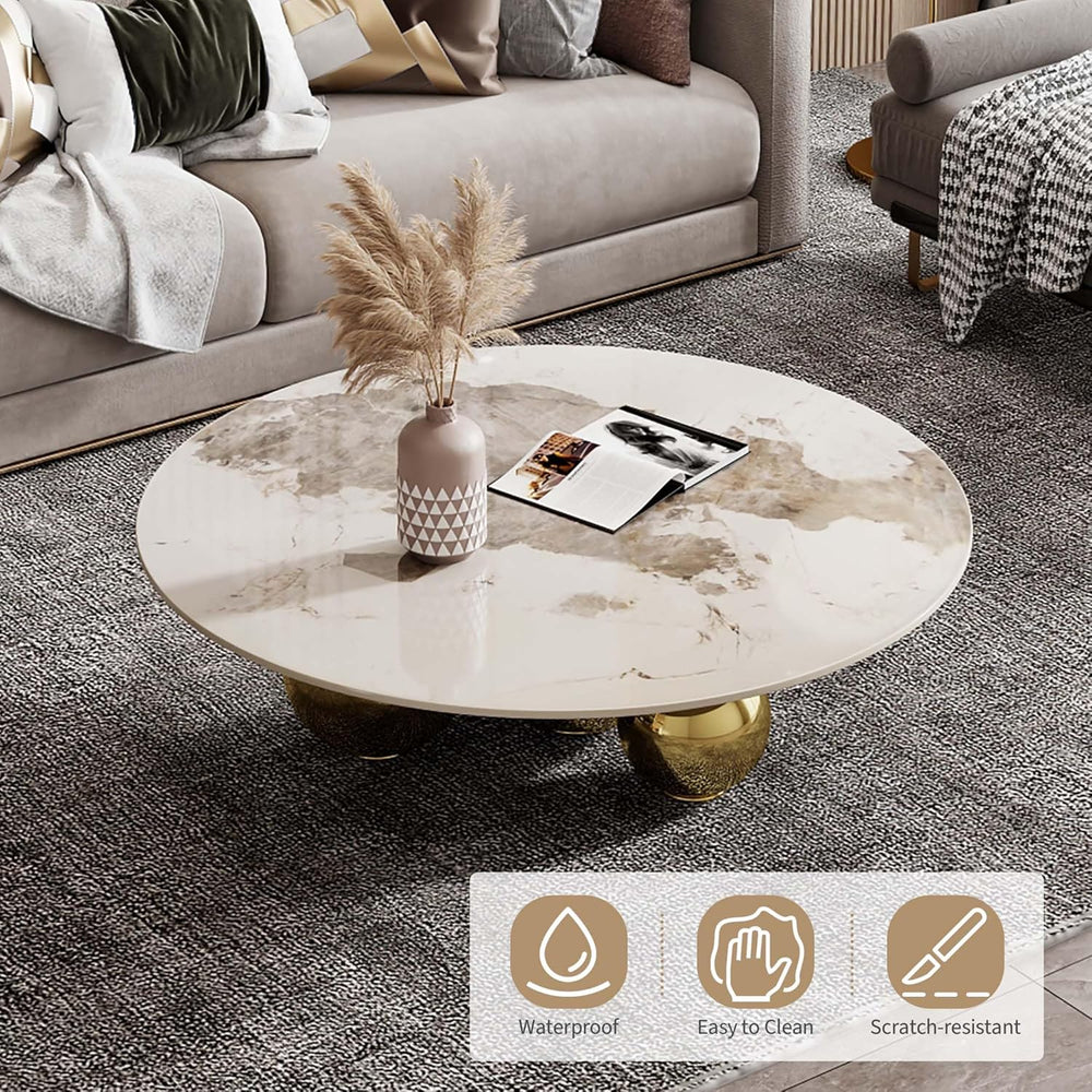Round marble coffee table in a living room with decorative items and a label indicating features.