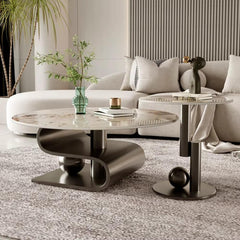 Modern living room with a stylish coffee table and decorative items.