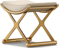 Beige ottoman with gold metal frame on a white background