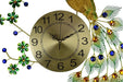 Decorative wall clock with peacock feathers and flowers on a white background