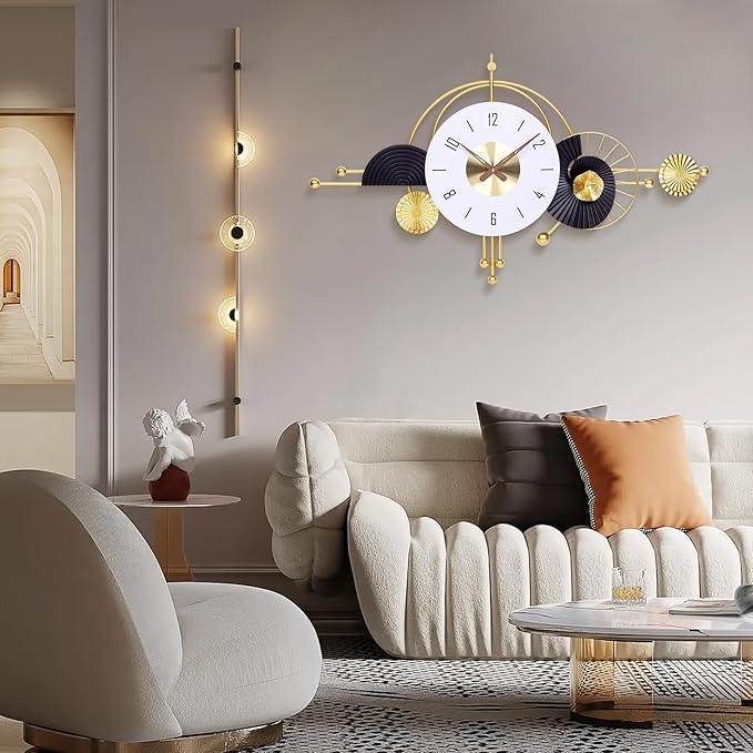 Decorative wall clock in a modern living room setting with a sofa and armchair.