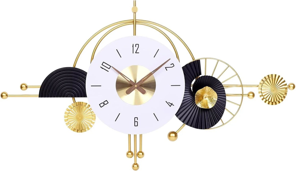Decorative wall clock with gold and black design on a white background