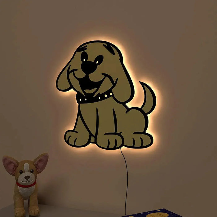 Dog-shaped wall light on a plain wall with a small plush dog toy below.