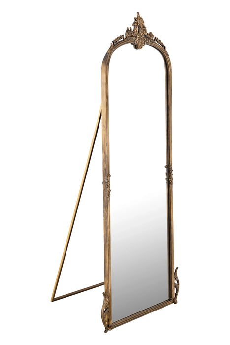 Decorative standing mirror with gold frame on a white background