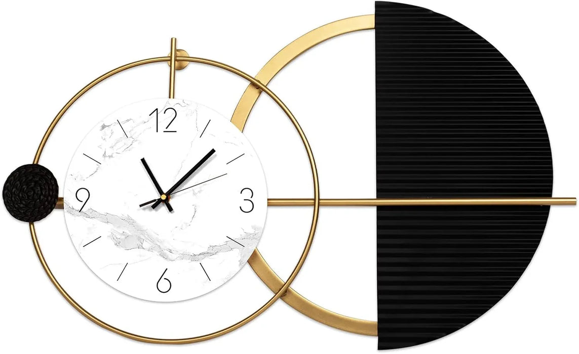 Modern wall clock with gold frame and black and white design