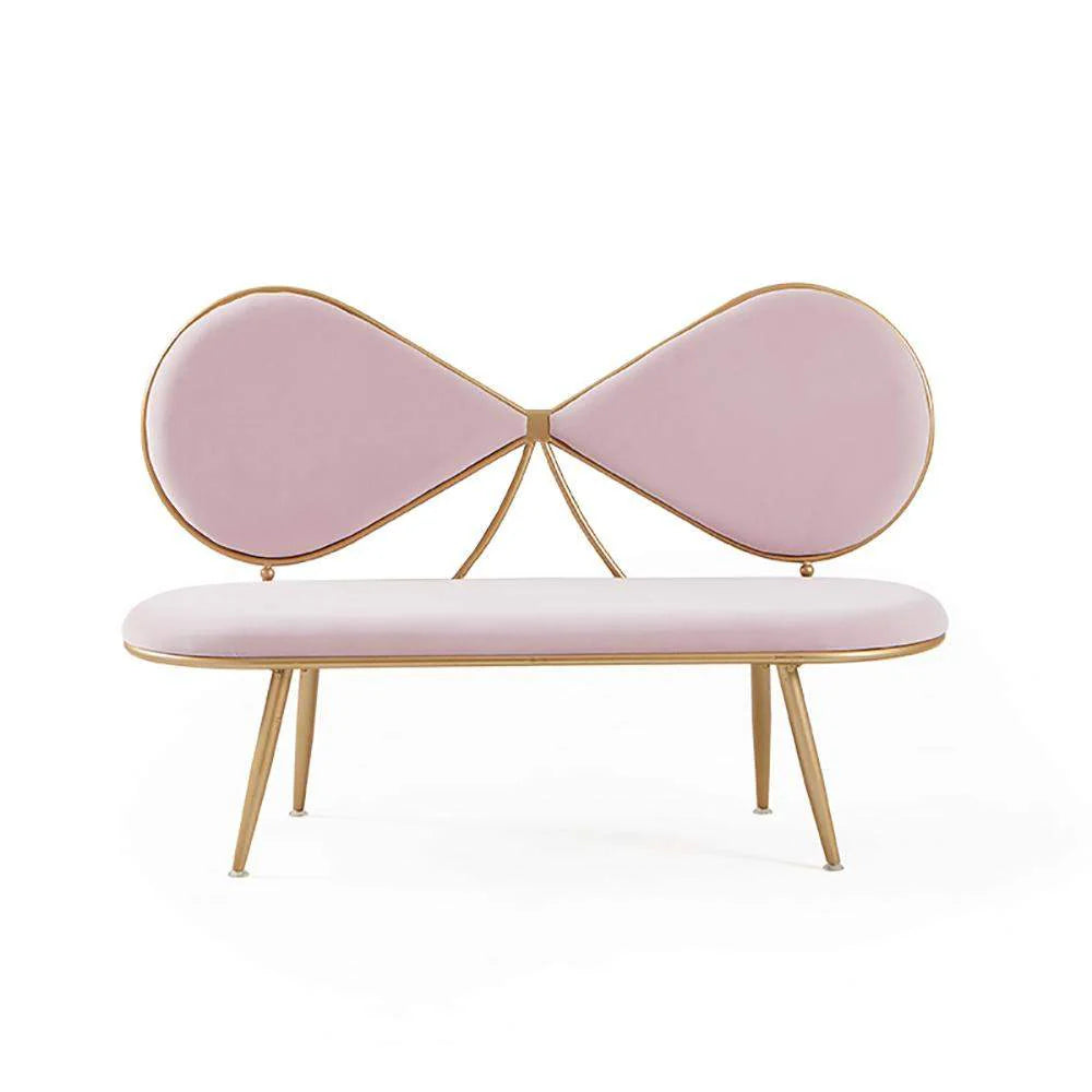 Pink bow-shaped bench with gold accents on a white background