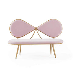 Pink bow-shaped bench with gold accents on a white background