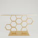 Decorative shelf with honeycomb design on a white background
