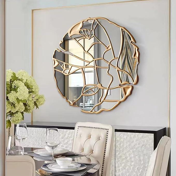 luxury wall mirror with gold leaf design in a dining room setting