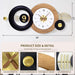 Decorative wall clock with wooden and black design, featuring measurements and product details.