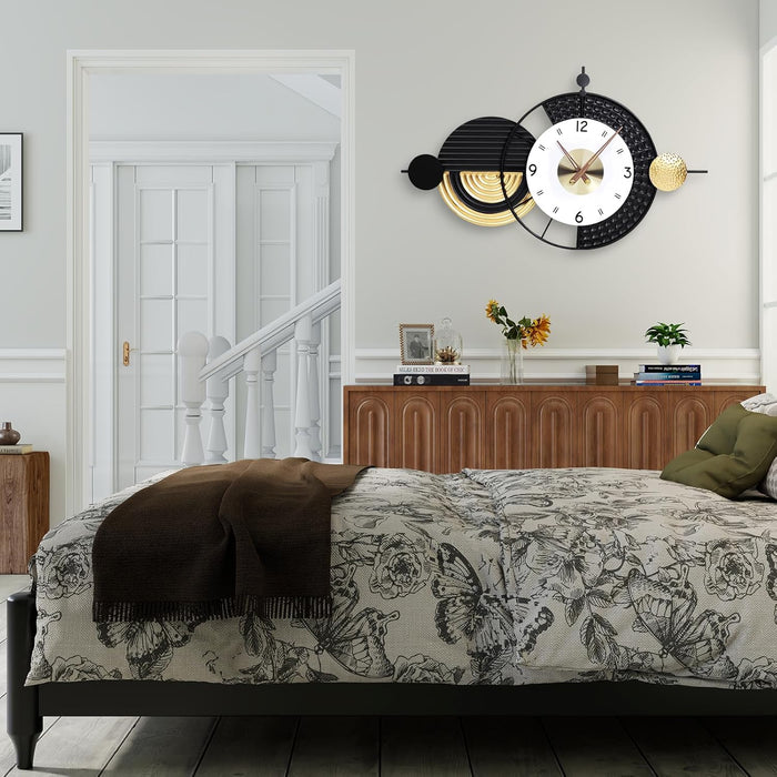 Decorative wall clock on a wall above a bed with floral bedding.