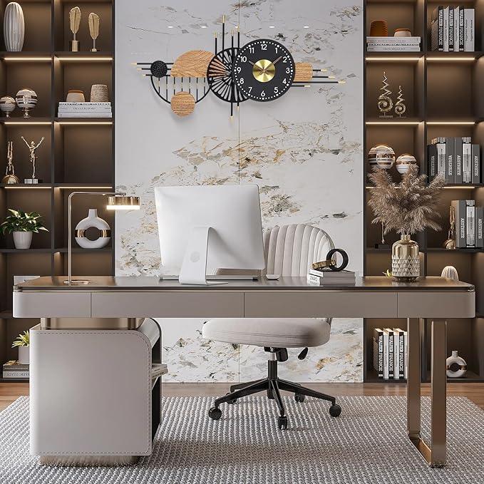 Modern office desk with computer monitor, chair, and decorative shelves.