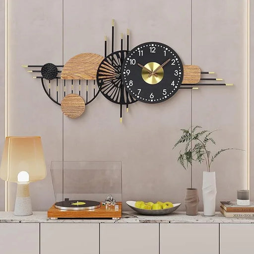 Decorative wall clock with wooden and metallic design in a room setting.