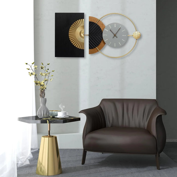 Modern living room with a brown armchair, gold side table, and decorative wall clock.