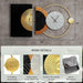 Decorative wall clock with gold and black design on a gray background