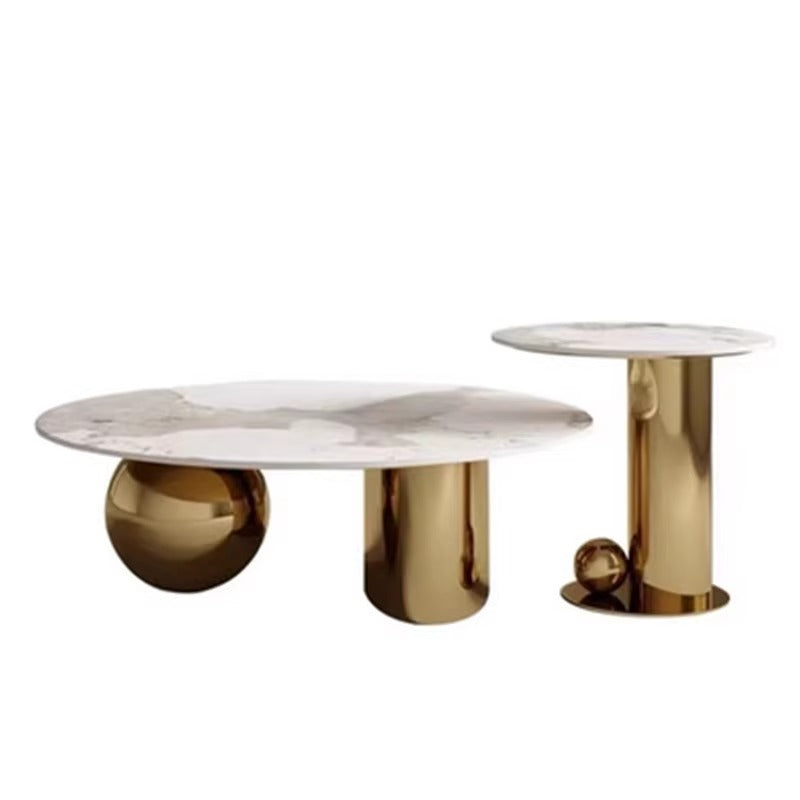 Two marble and gold side tables on a white background