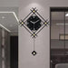Decorative wall clock with geometric design on a wall.