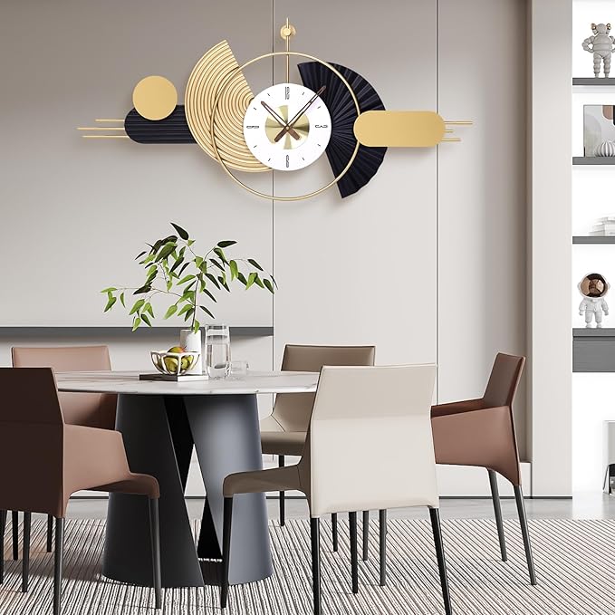 gold and black modern wall clock on wall